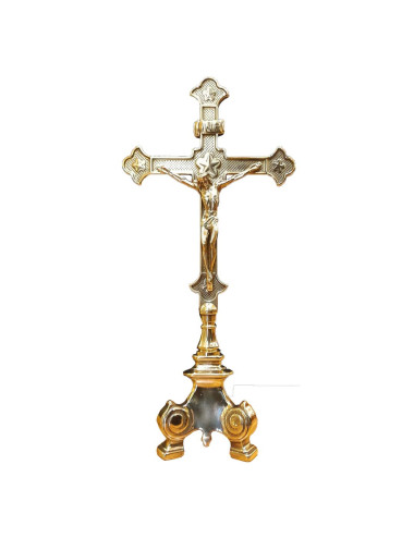 Cruz de altar realizada en metal decorada con estrellas