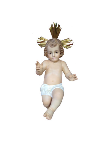 Niño Jesús tumbado realizado en pasta de madera