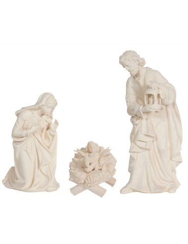 Image of the Holy Family made in wood carving with a child in a crib
