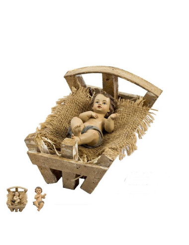 Niño Jesús realizado en resina y cuna de madera